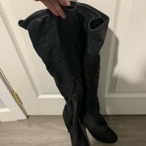 Knee high black stilettos